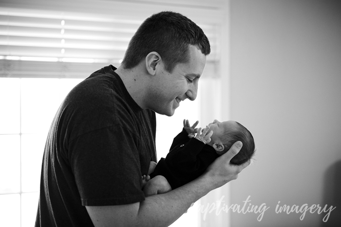 dad holding baby