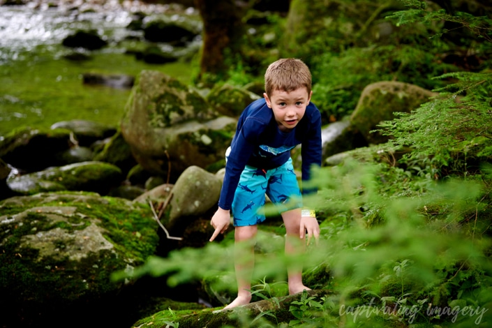 boy with creek in background