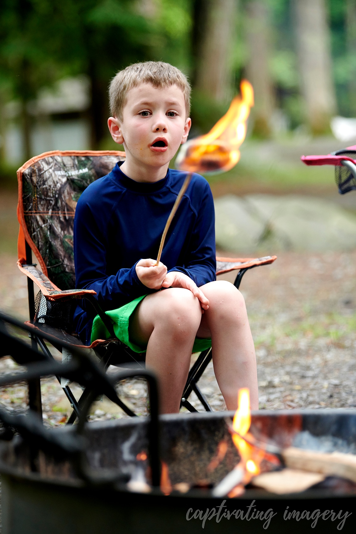 boy with marshmallow on fire