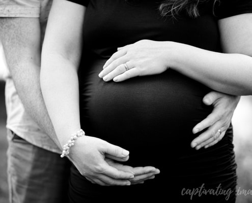 close-up of parents' hands