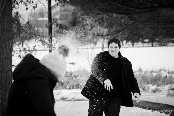 Gotcha snowball fighting fiancés - Cranberry Engagement Session