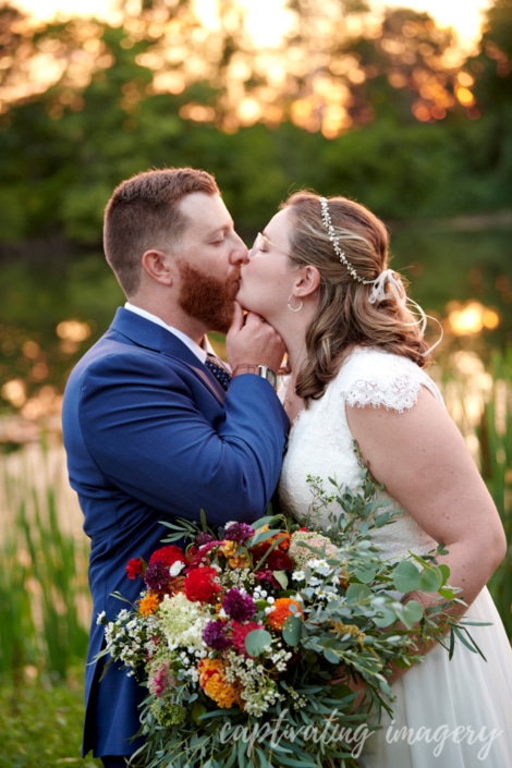 sunset and wildflower bouquet - Sunset wedding photos at The Atrium